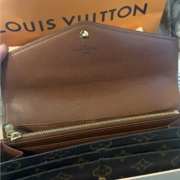 Louis Vuitton Sarah wallet.